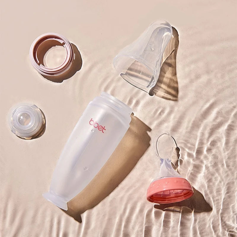 BBET BPA Free Toddlers Spoon Bottle Feeder علبة إطعام الرّضّع، مصنوعة من السيلكون الممتاز